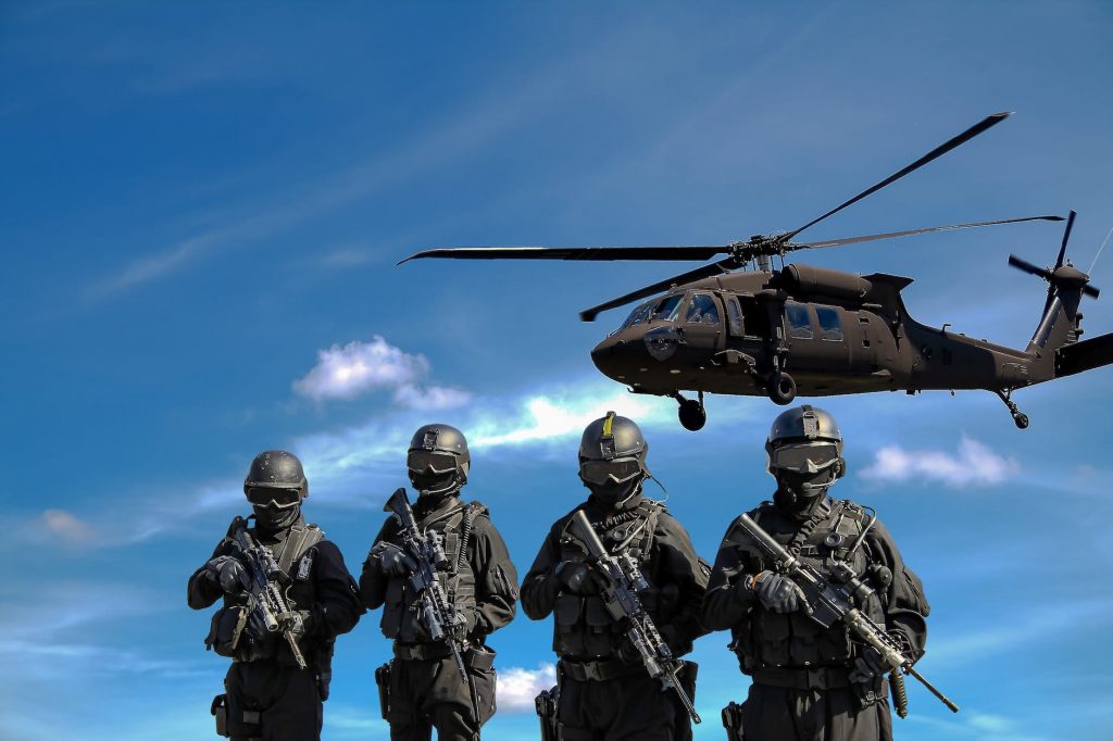 four soldiers carrying rifles near helicopter under blue skyGenyoutube download photo army lover